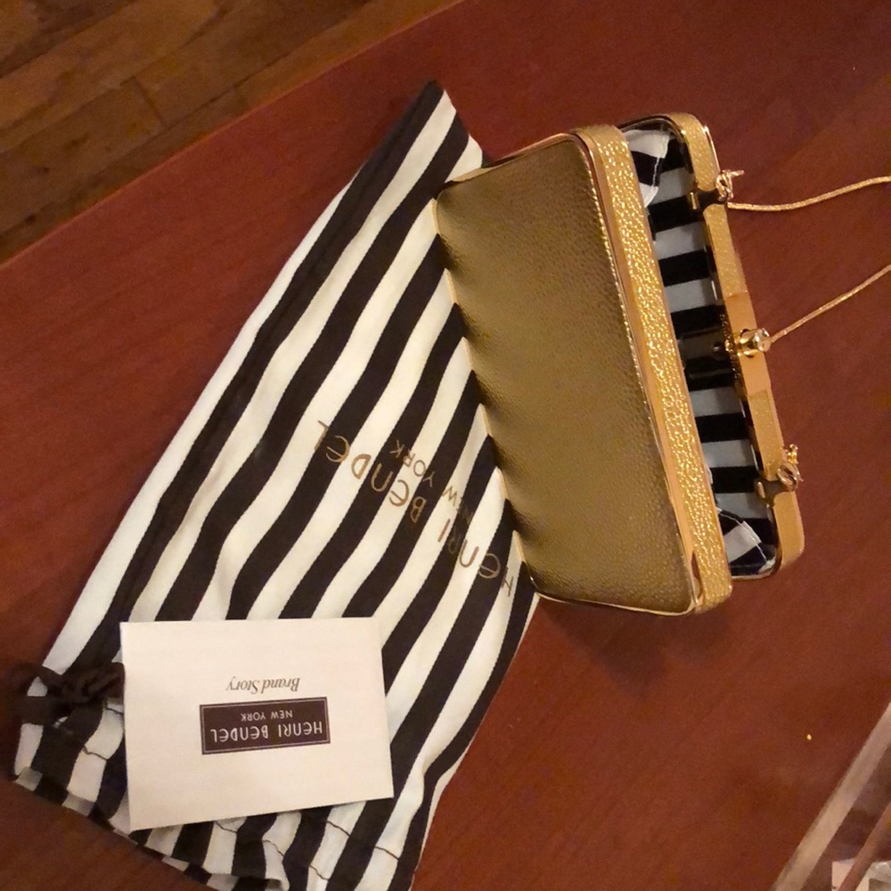 Henri bendel gold leather clutch